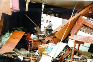 Looking through a mobile home after the Spring Creek Flood