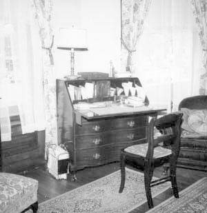 Desk and chair in southeast corner