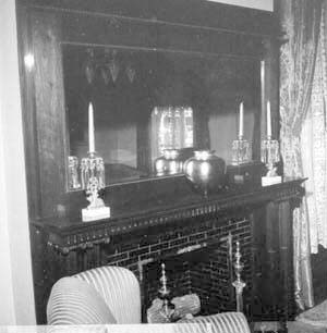 Fireplace mantel on north wall