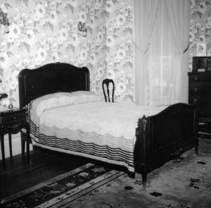Bed on north wall looking northeast