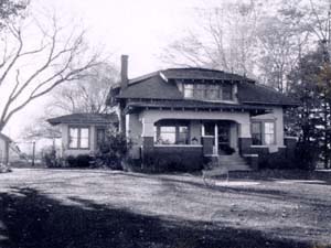 1125 S. Shields, c.1968 - one story stucco and brick residence with attic, front & back (enclosed) porches, garage, and four other outbuildings, built c. 1920-26